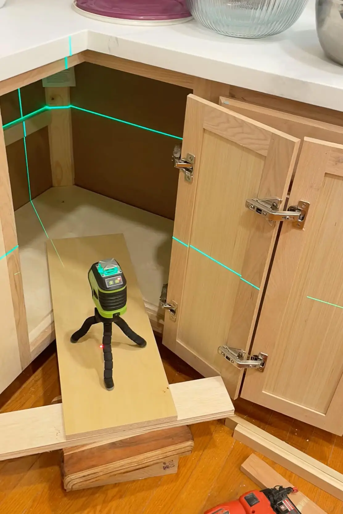 Installing cleats for shelf after removing a Lazy Susan cabinet.